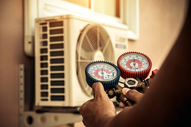 Professional Hvac technician working in Topeka, KS